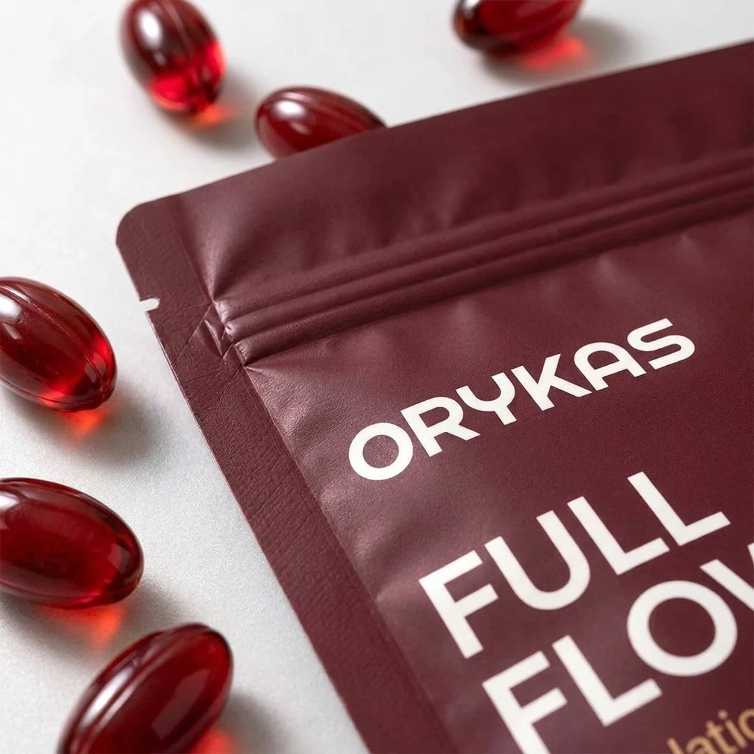 Gros plan sur le sachet Full Flow et ses capsules